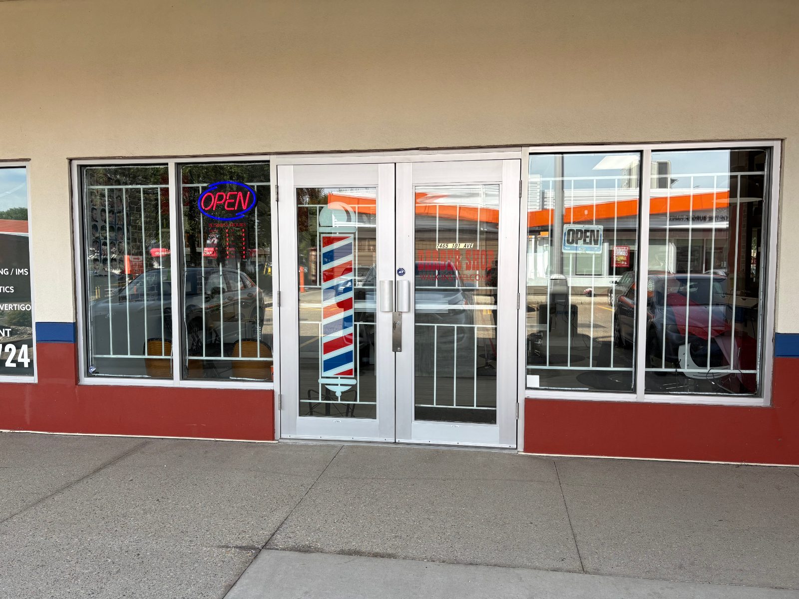 Exterior storefront of Capilano Barbershop at 7465 101 Ave NW, Edmonton