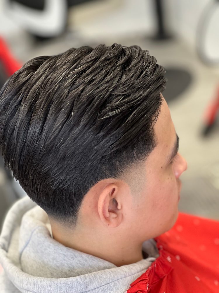Textured taper haircut with a natural finish